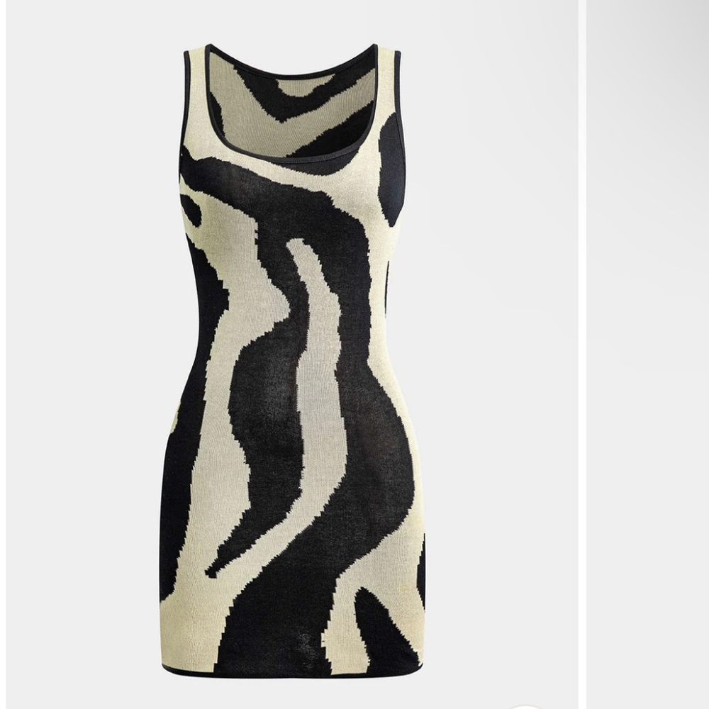 Elegant Black and Cream Patterned Mini Dress